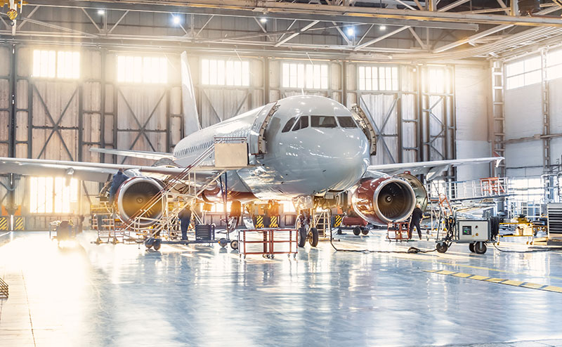 Aircraft inside hanger for maintenance