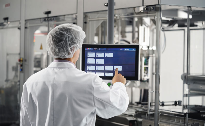 Engineer in Food & Beverage Industry Operating HMI