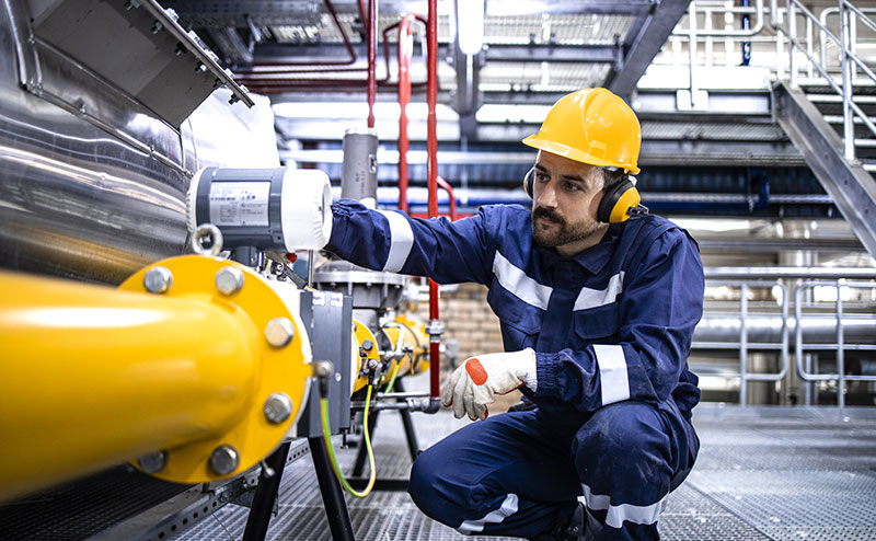 Engineer reading sensor data