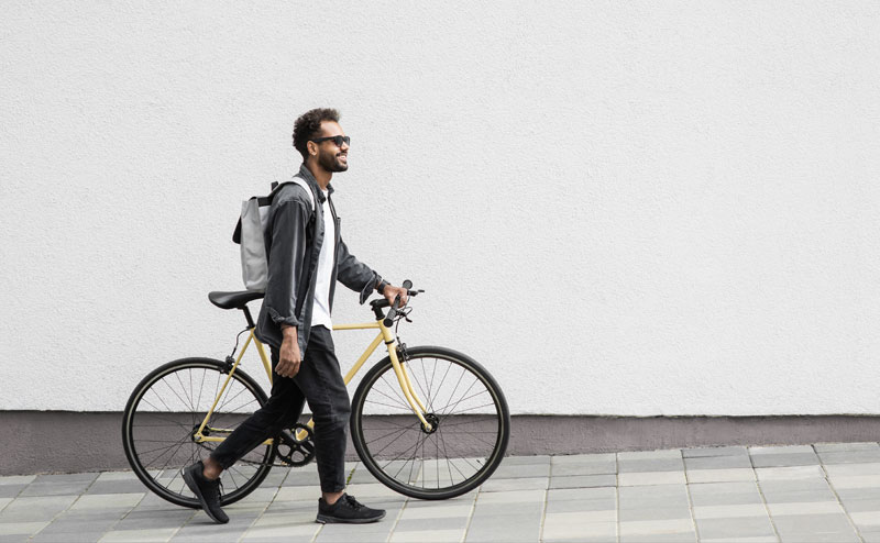 Happy man commuting to work