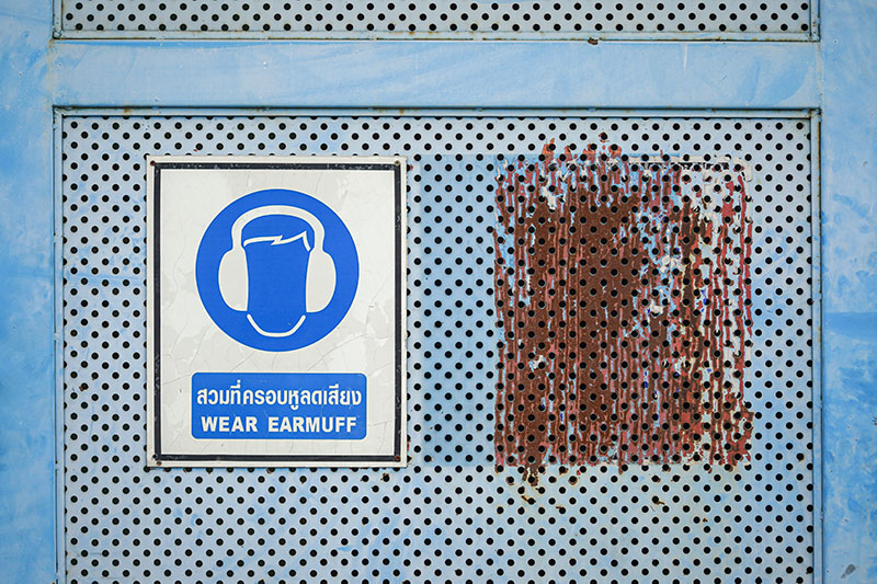 Wear ear defenders PPE signage