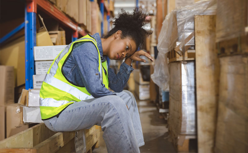 Young employee unhappy at work